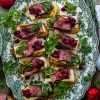Steak, Brie, and Roasted Cranberry Crostinis 